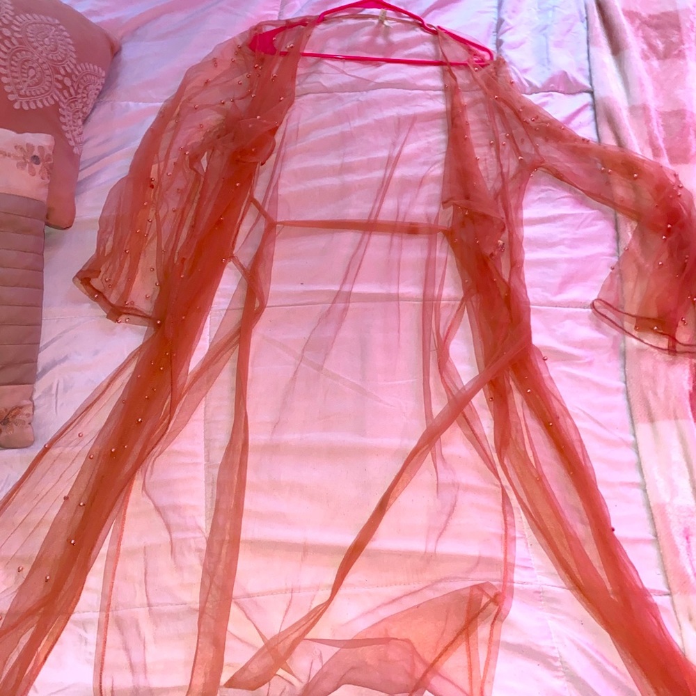 Light pink and feather light and fabulous summer cardigan